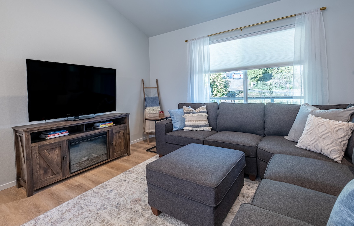 Living room with sectional sofa and TV